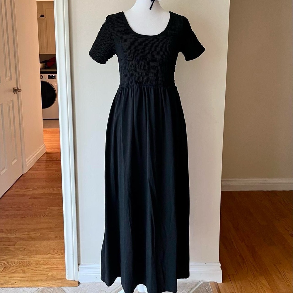 Black Smocked Dress reminds me of the Cristy Dawn scarlet dress